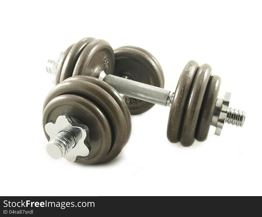 Dumbbells towards white background