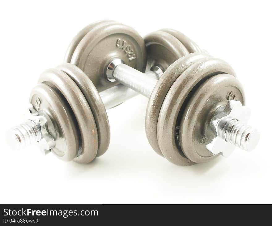 Dumbbells towards white background