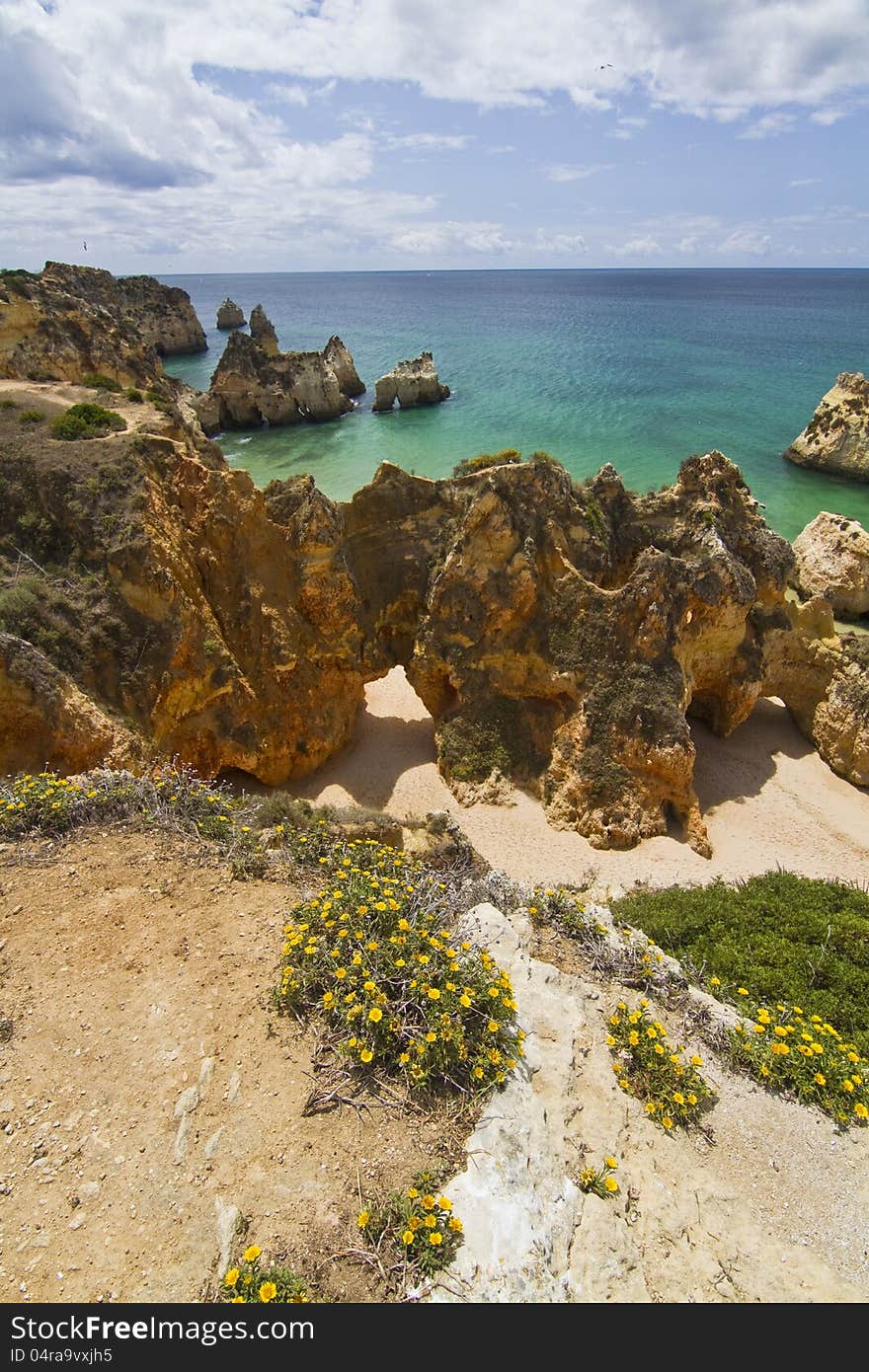 Wonderful view of a beautiful beach in the Prainha area, in the Algarve, Portugal. Wonderful view of a beautiful beach in the Prainha area, in the Algarve, Portugal.