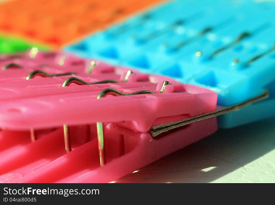 A set of Colored plastic clothes pegs