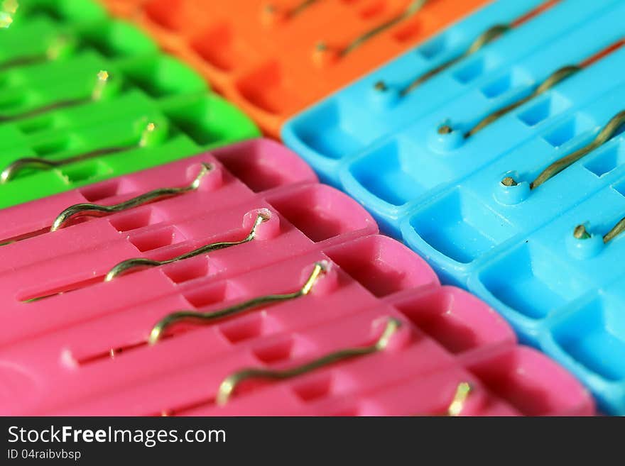 Colored plastic clothes pegs