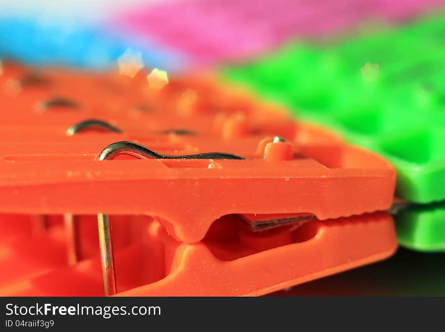 A set of Colored plastic clothes pegs