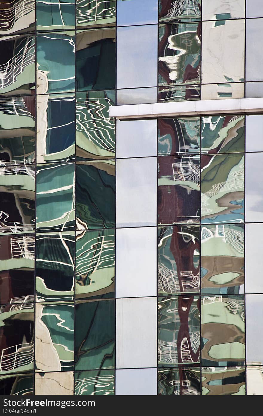 Glass detail view of the wall structure of a modern building. Glass detail view of the wall structure of a modern building.