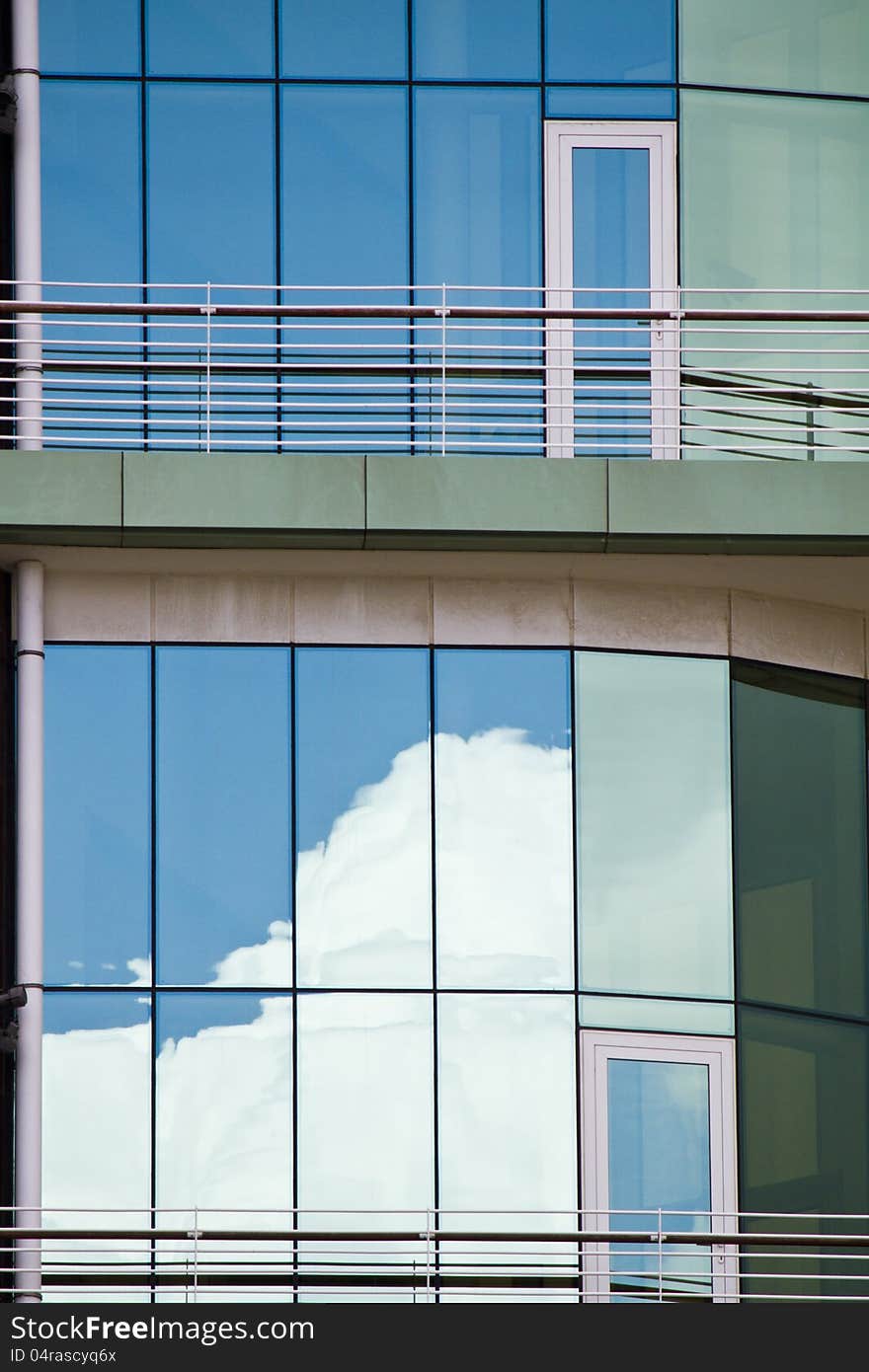 Glass detail view of the wall structure of a modern building. Glass detail view of the wall structure of a modern building.