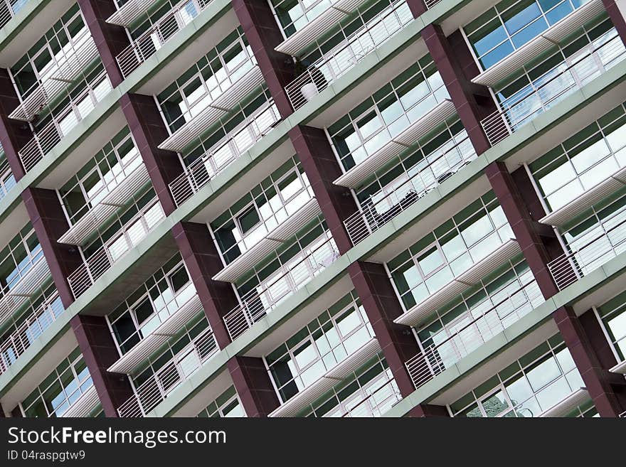 Glass detail view of the wall structure of a modern building. Glass detail view of the wall structure of a modern building.