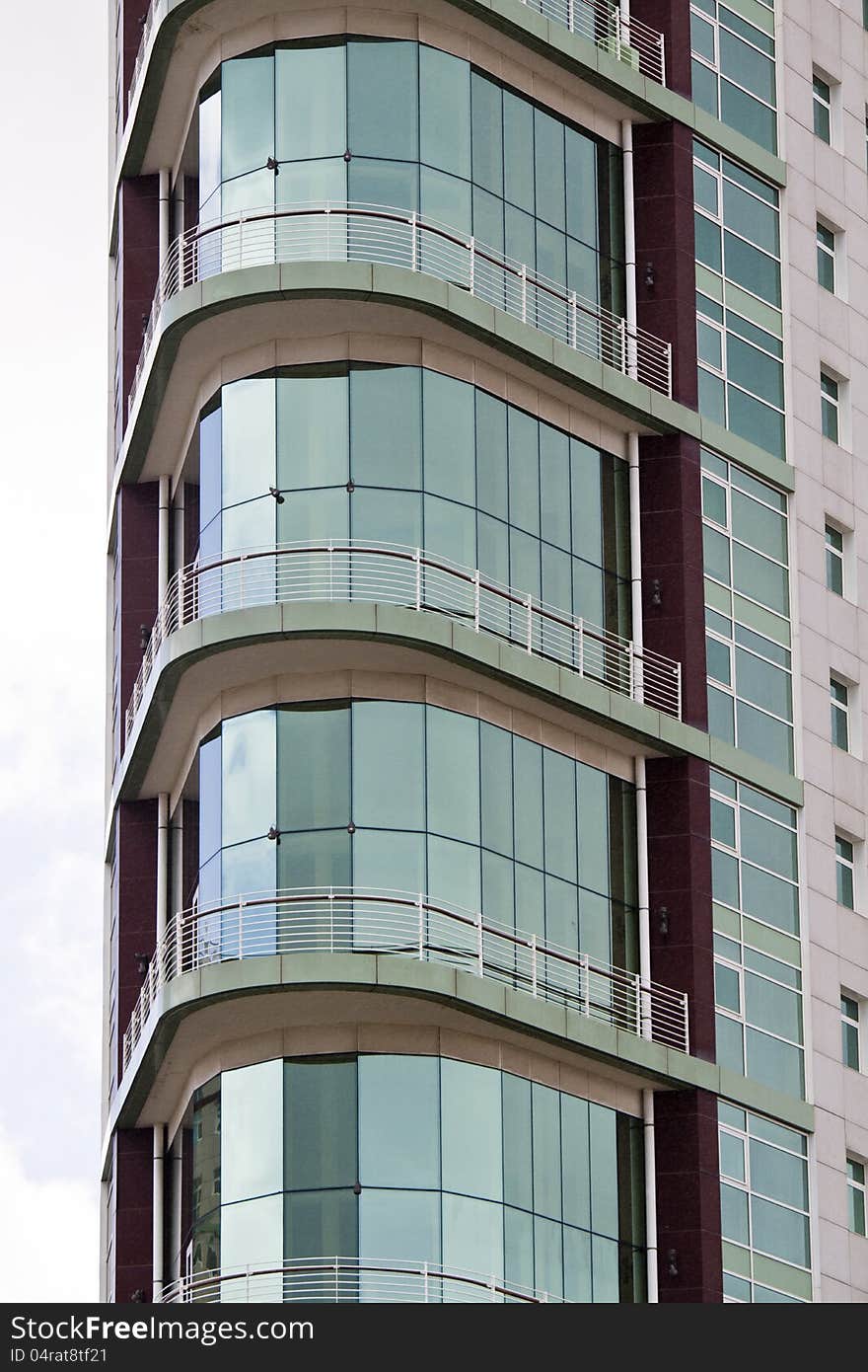 Glass detail view of the wall structure of a modern building. Glass detail view of the wall structure of a modern building.