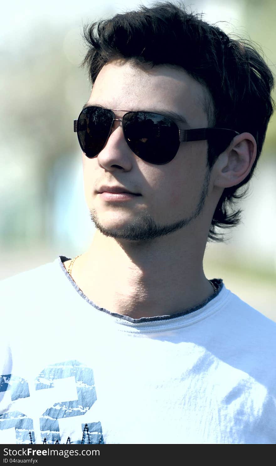 Attractive guy wearing sunglasses