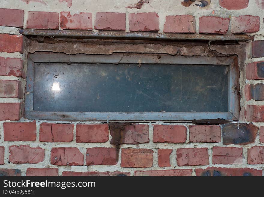 Filthy, broken window in an old building. Filthy, broken window in an old building