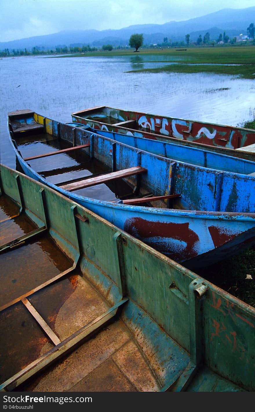 Rusty boats in lashi lake, Lijiang, China, 2005.