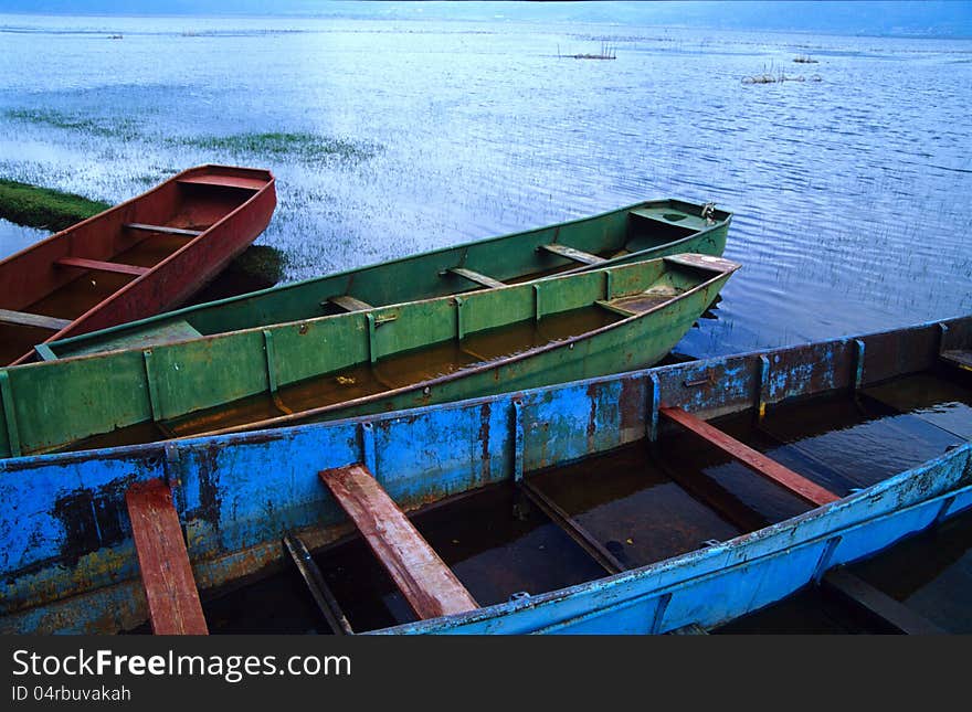 Rusty boats in lashi lake, Lijiang, China, 2005.