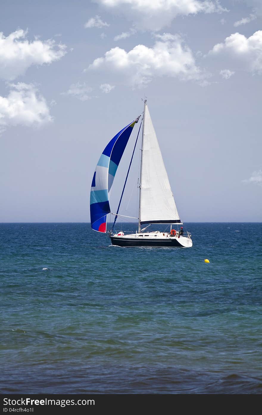 View of a recreational boat alone on the high sea.