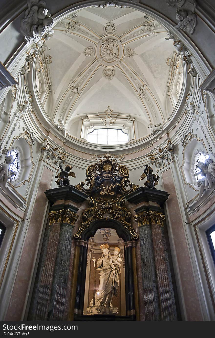 Virgin Mary baroque altar in the church of San Marco in Milan, Italy.