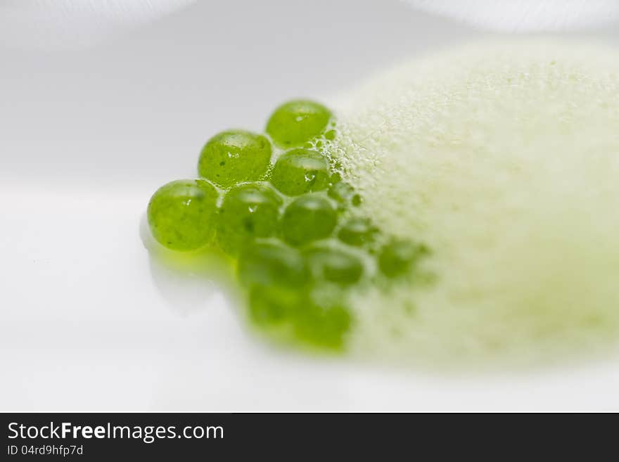 Close up view of some green caviar of a gourmet dish. Close up view of some green caviar of a gourmet dish.