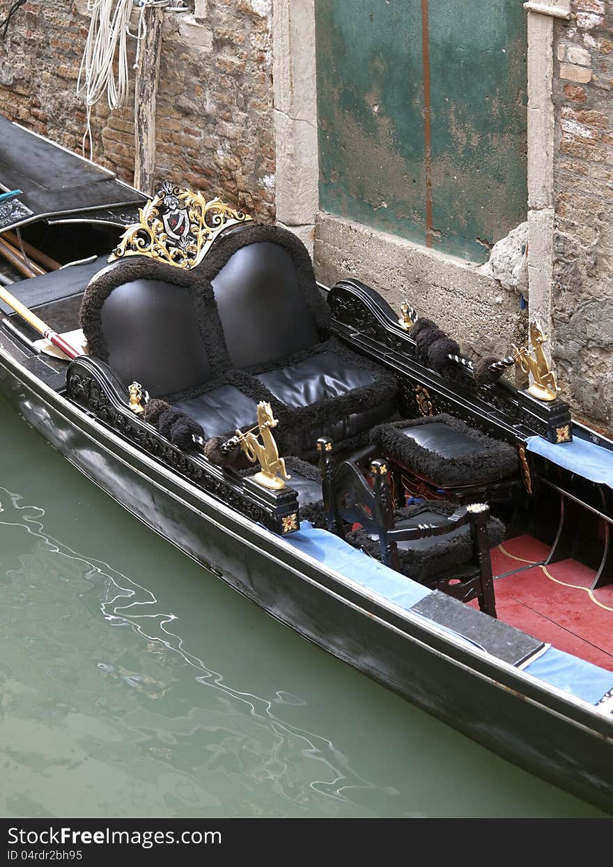 Gondola parked near the wall. Gondola parked near the wall.