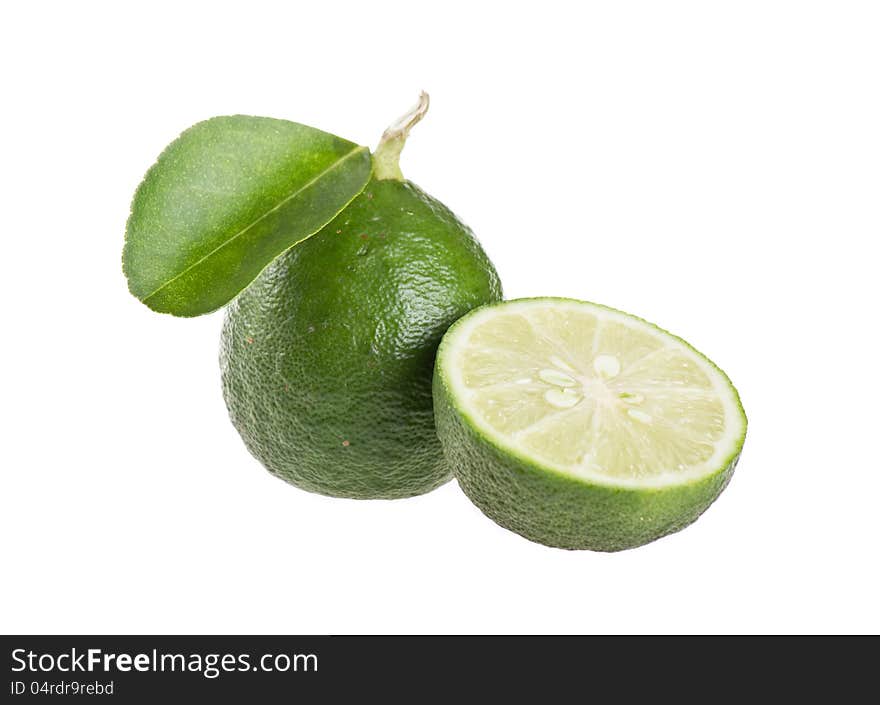 Fresh limes isolated on white