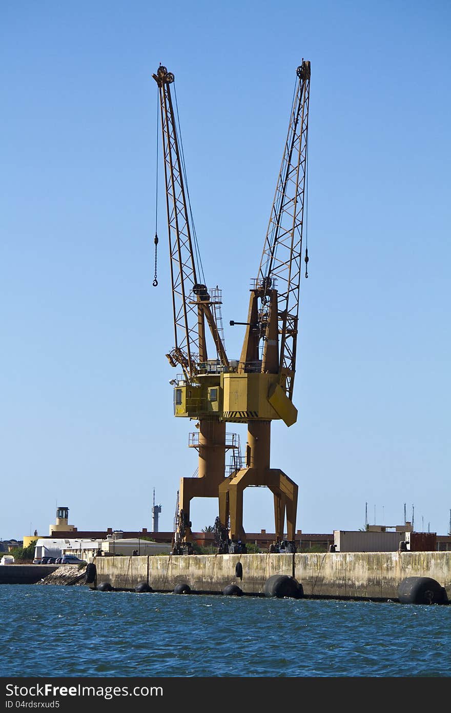 View of a port crane at the docks.