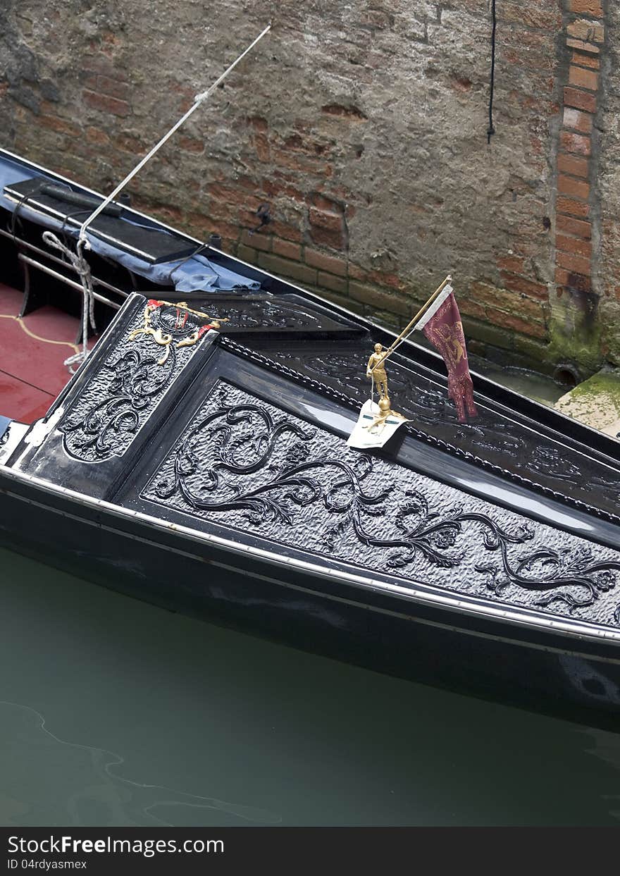 Gondola parked near the wall. Gondola parked near the wall.