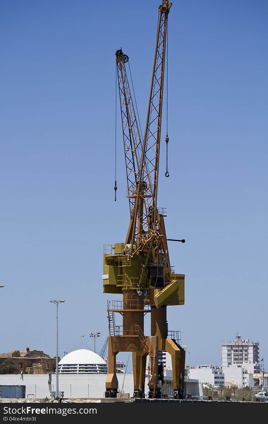 View of a port crane at the docks.