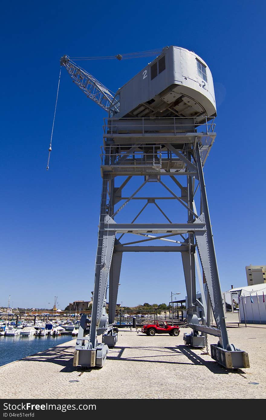 View of a port crane at the docks.