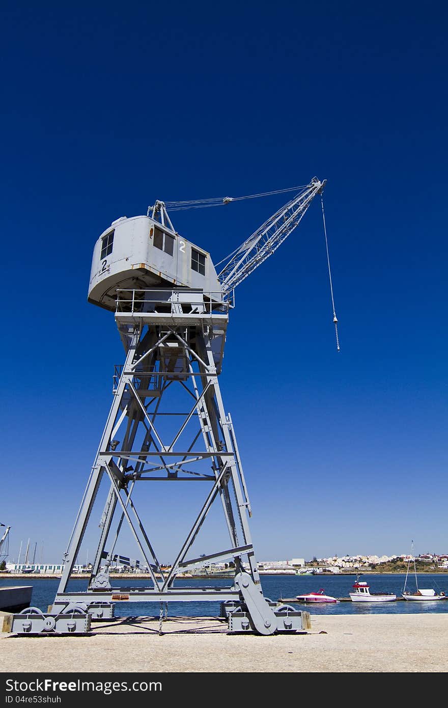 View of a port crane at the docks.