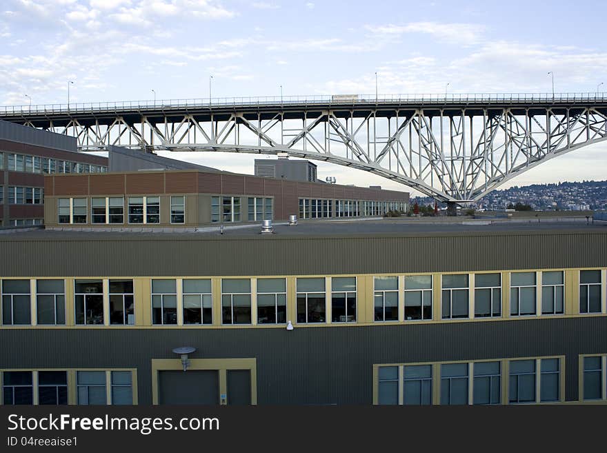 Boxy Office Buildings Under Bridge