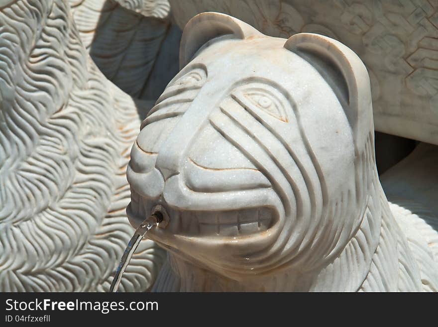 Details of an animal head statue water fountain. Details of an animal head statue water fountain