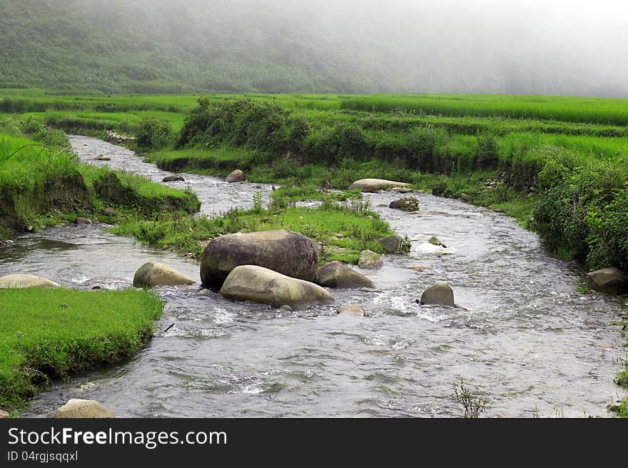 A creek running through a village