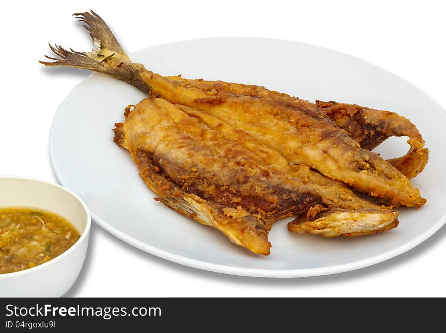 Seriola fried fish with spicy sauce on isolate background