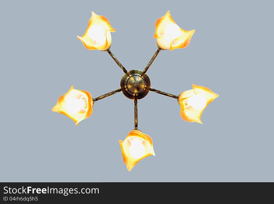 Chandelier with five lamps on a blue background