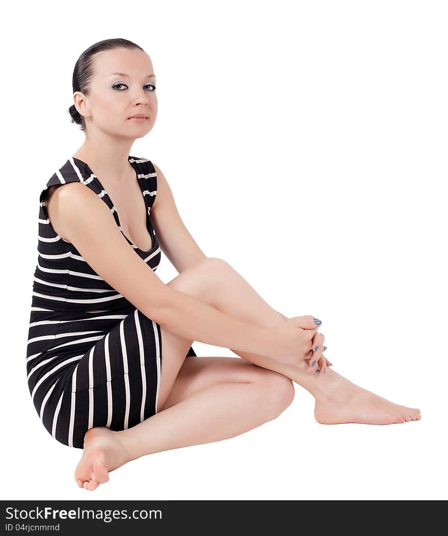 Pretty girl posing sitting isolated white background