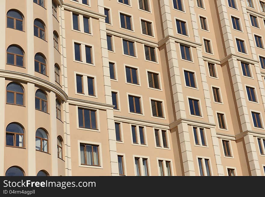 Side view on the generic red brick office building. Side view on the generic red brick office building