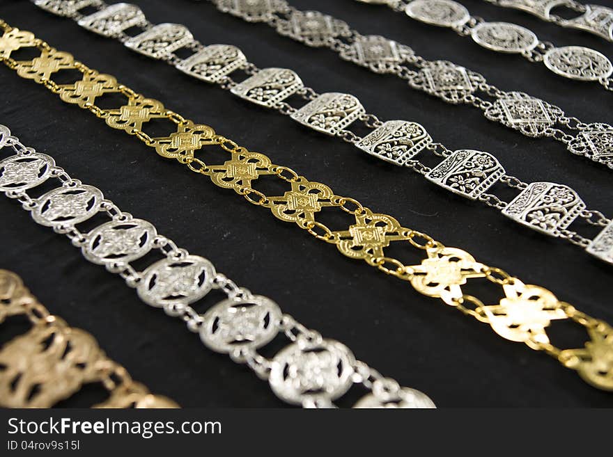 Necklaces, belts, jewelry made ​​of silver.