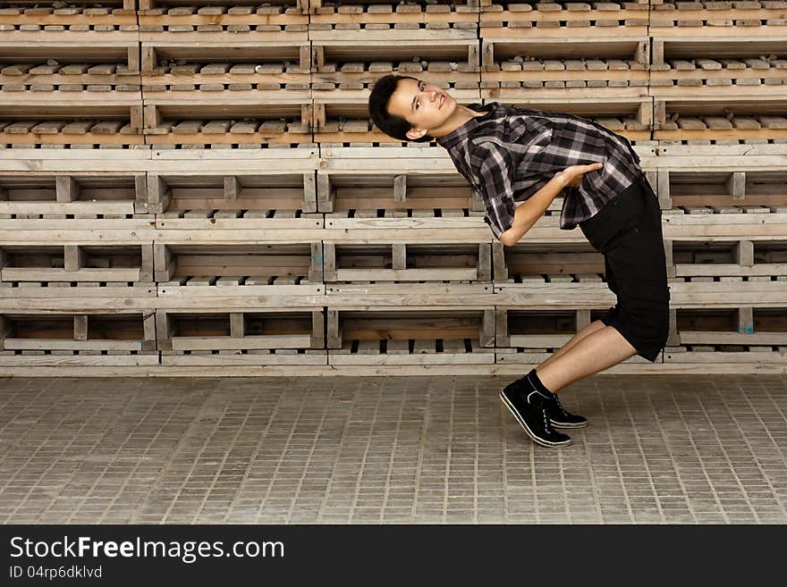 Atheletic young man stay near the boards. Atheletic young man stay near the boards