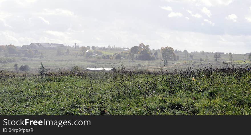 Rain and sunshine. Countryside landscape of Lithuania.