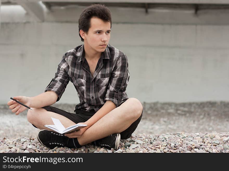 Boy with notebook