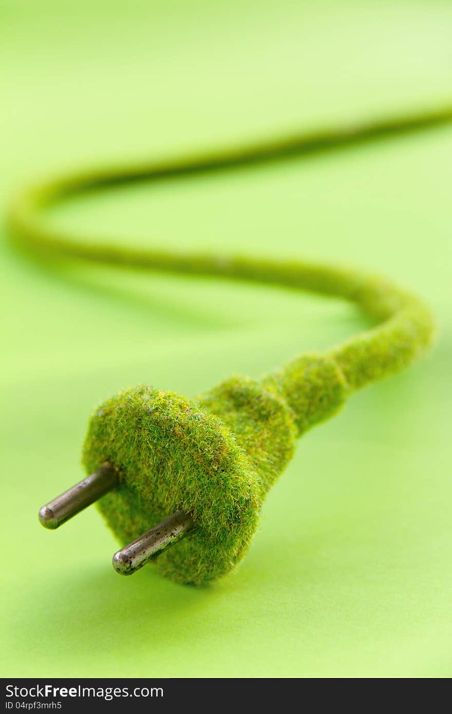 Abstract image of green electric plug , save energy concept