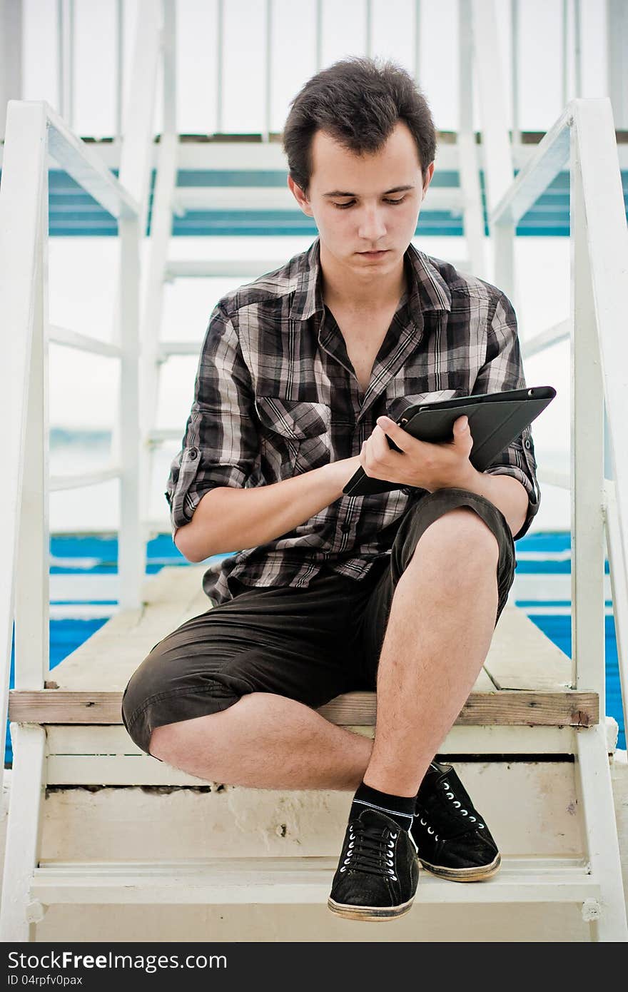 Boy with flatbed computer