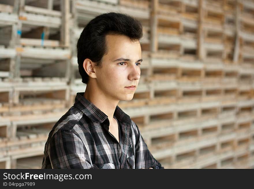 Young man stay near the boards