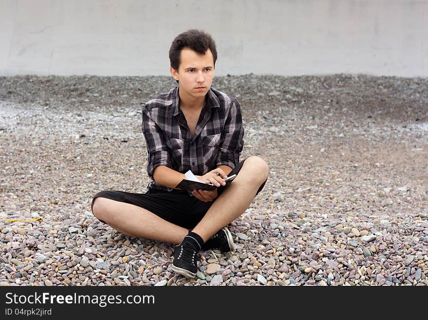 Boy with notebook