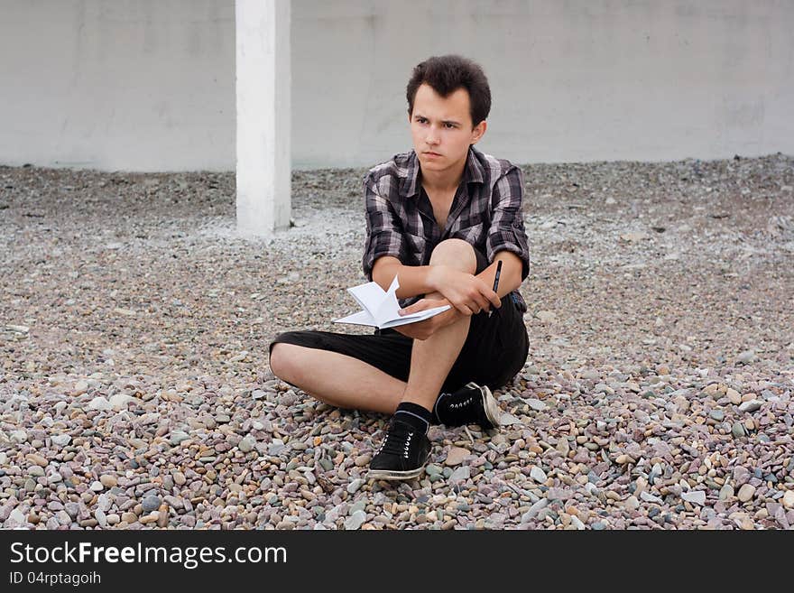 Boy With Notebook