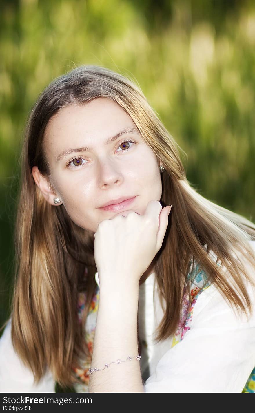 Portrait of beautiful blond woman outdoors