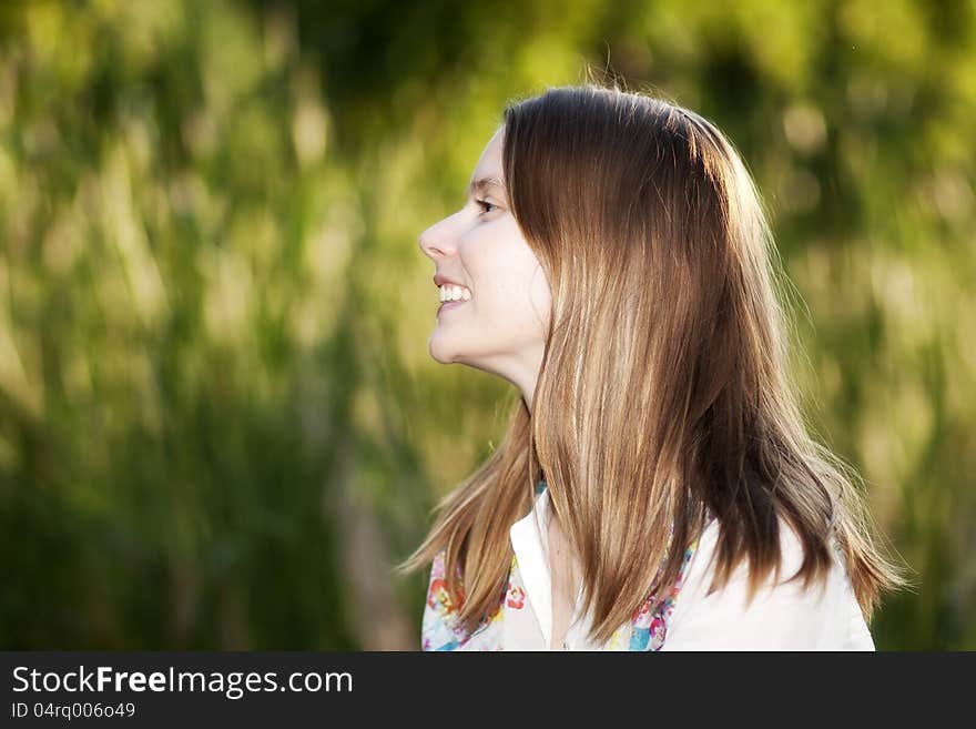 Portrait of beautiful blond woman outdoors