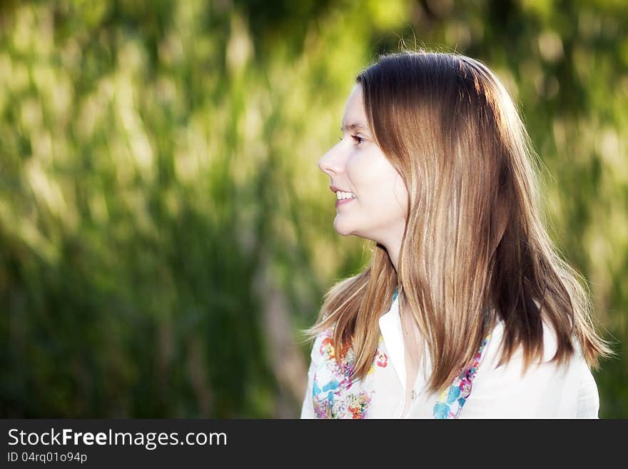 Portrait of beautiful blond woman outdoors