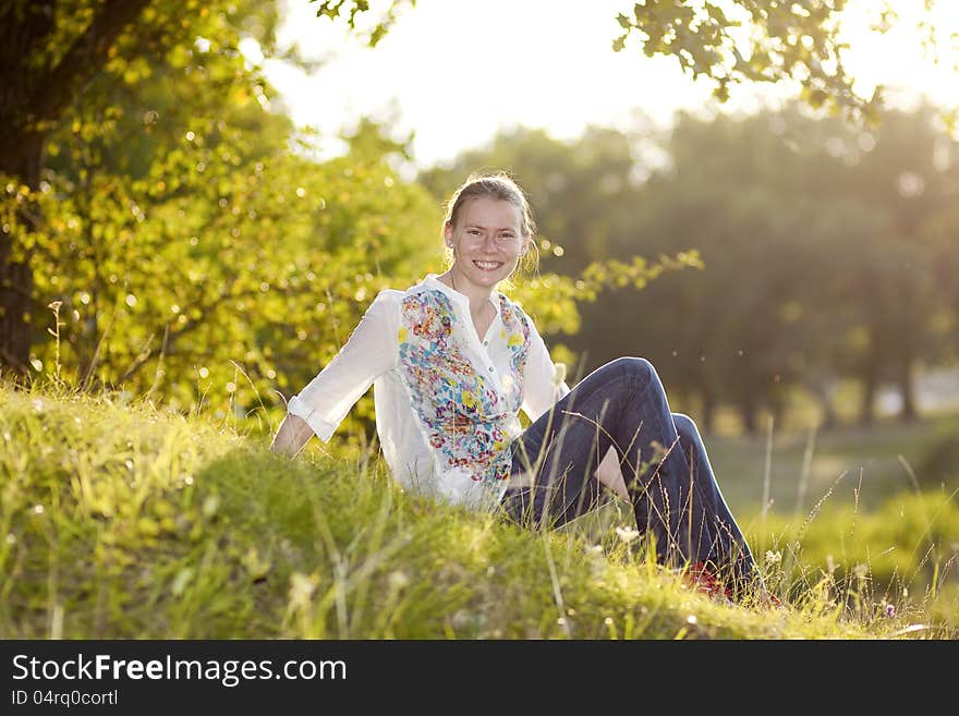 Portrait of beautiful blond woman outdoors