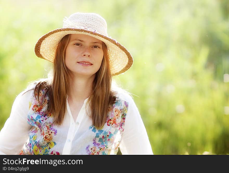 Portrait of beautiful blond woman outdoors