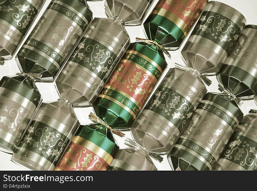 Glittery red and green christmas crackers. Glittery red and green christmas crackers