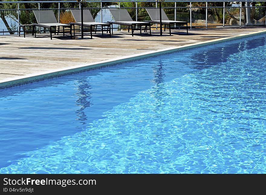 Swimming Pool And Chairs