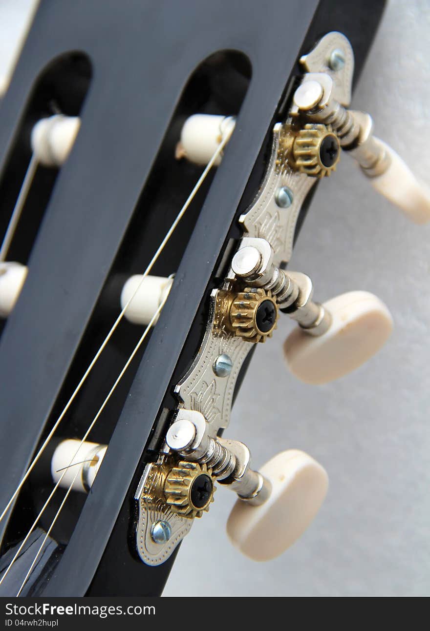 Acoustic guitar on a white background. Acoustic guitar on a white background