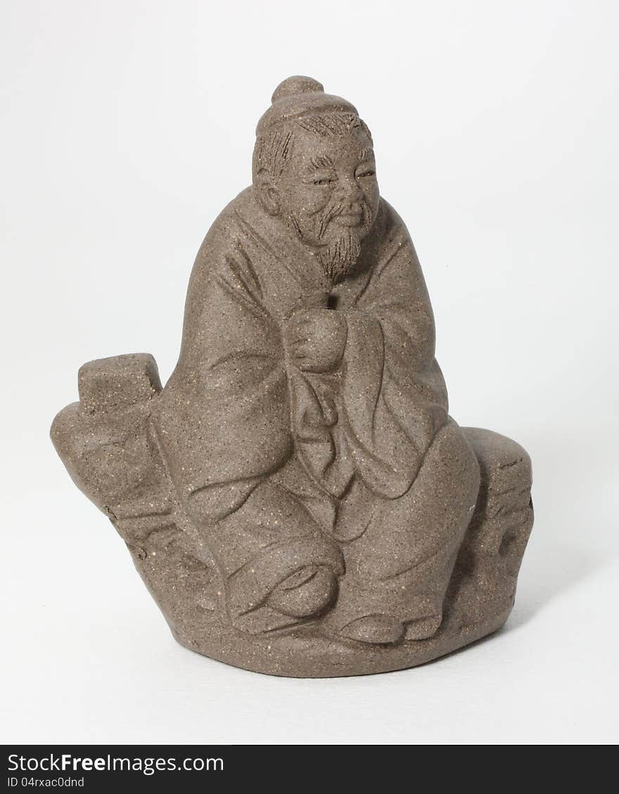 Sculpture of an old man sitting Chinese. Sculpture of an old man sitting Chinese