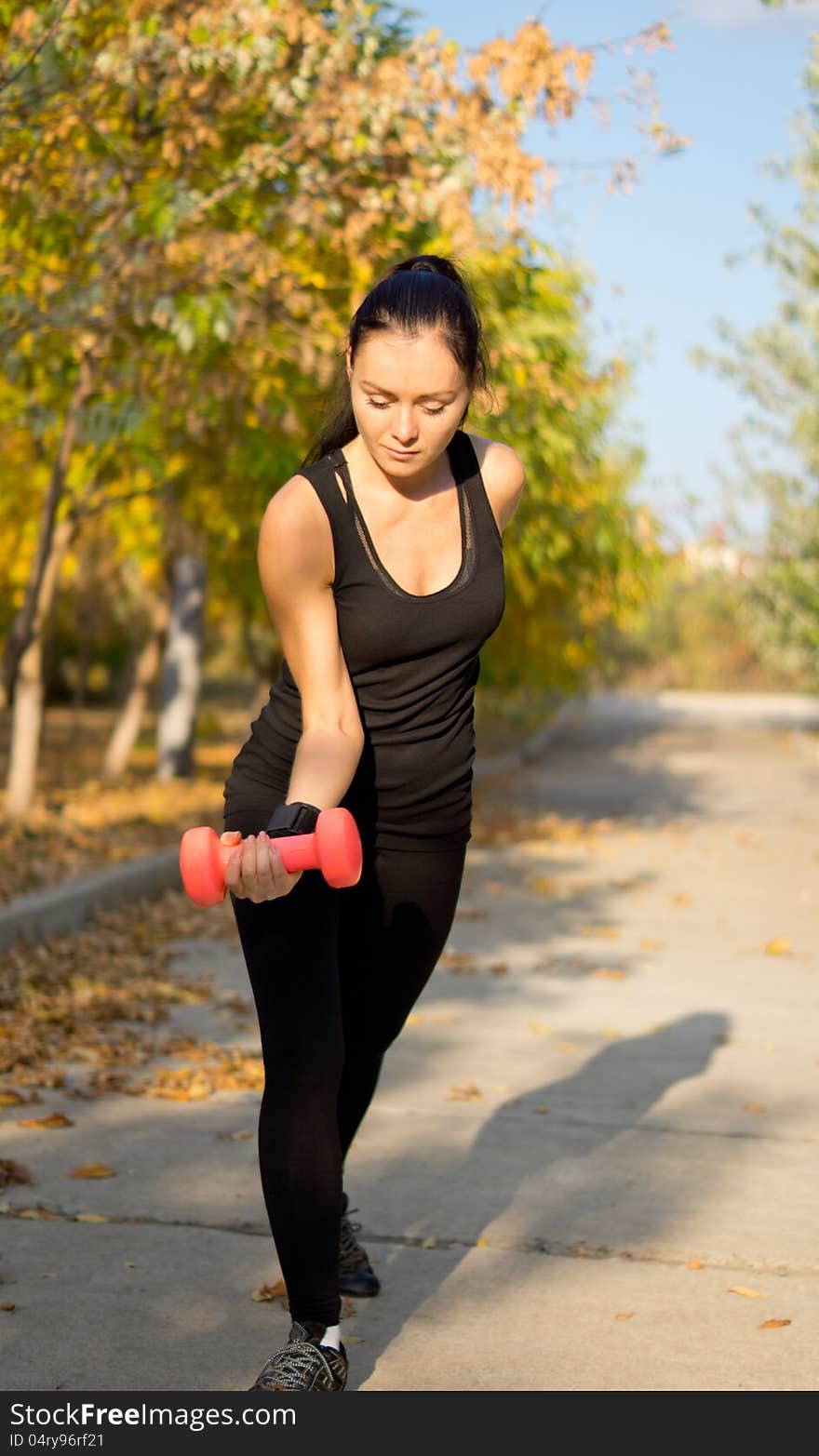 Woman Working Out With Weights